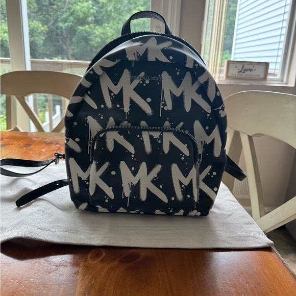 Michael Kors Handbags - Michael Kors Black and White MK Backpack